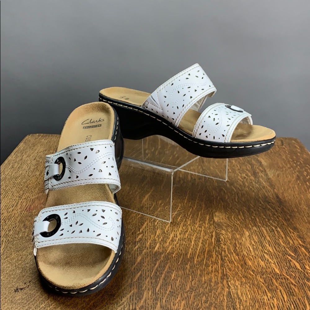 Clark’s white sandals